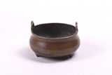 A CHINESE BRONZE TRIPOD CENSER 