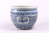 A CHINESE BLUE AND WHITE JARDINIERE