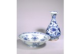 A BLUE AND WHITE 'LOTUS' VASE AND DISH